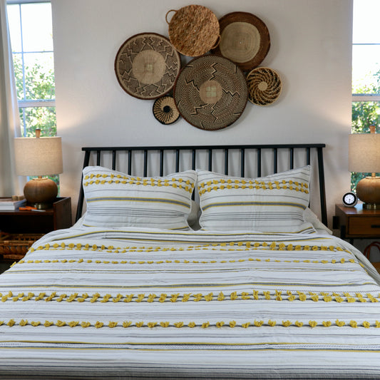 Minimal Ivory Comfy Quilt and Shams with Mustard Poms