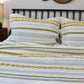 Minimal Ivory Comfy Quilt and Shams with Mustard Poms