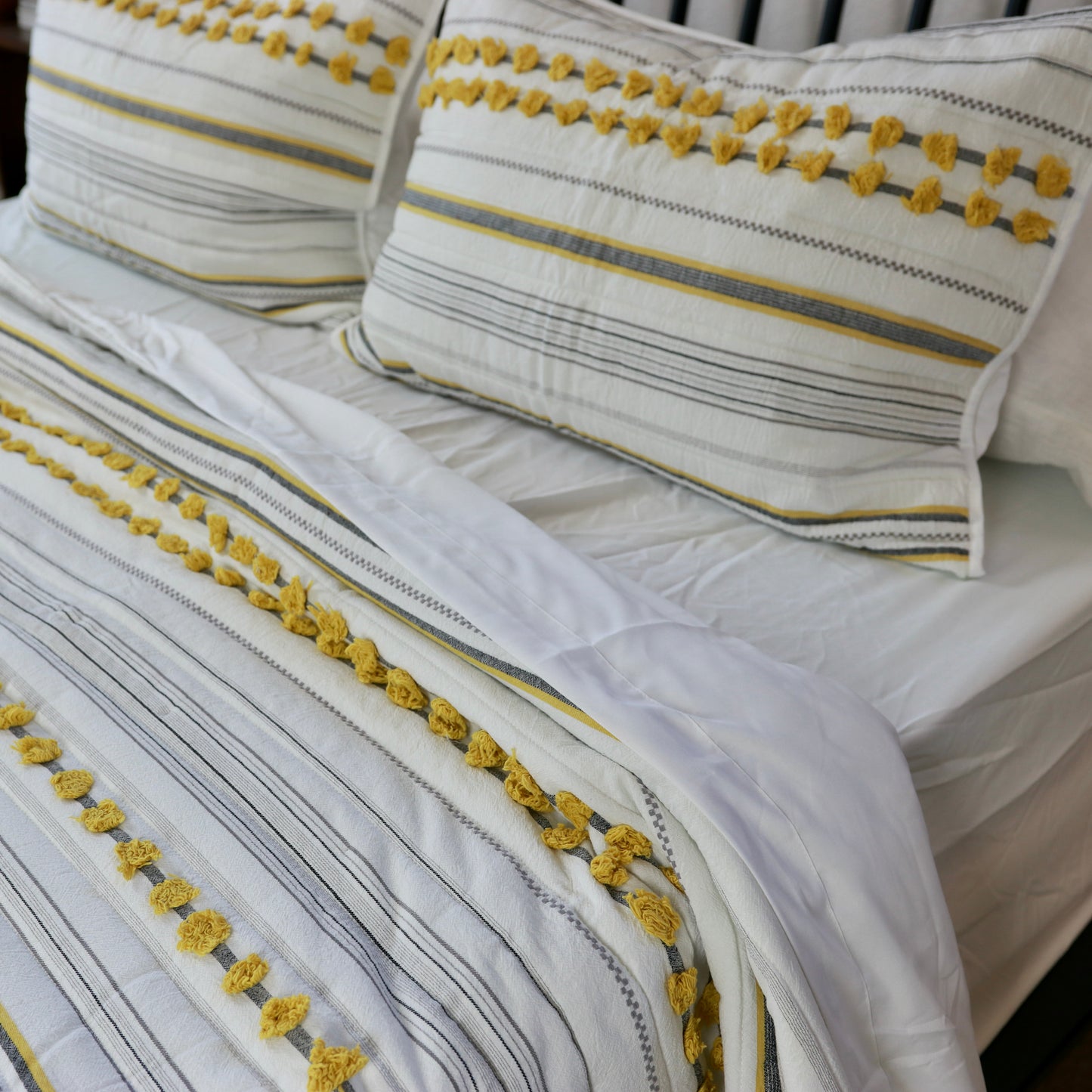 Minimal Ivory Comfy Quilt and Shams with Mustard Poms