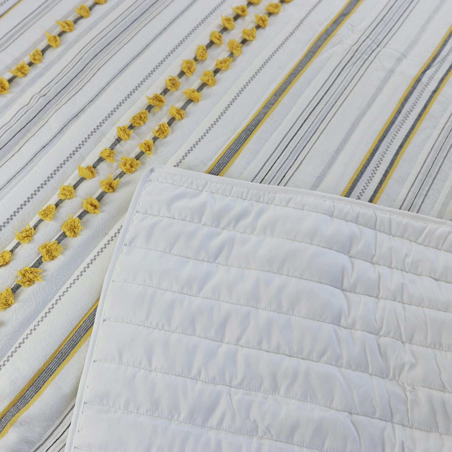 Minimal Ivory Comfy Quilt and Shams with Mustard Poms